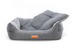 Gray pet bed with a visible brand logo on a white background Balmoral luxury grey herringbone bolster dog bed with soft faux-fur interior