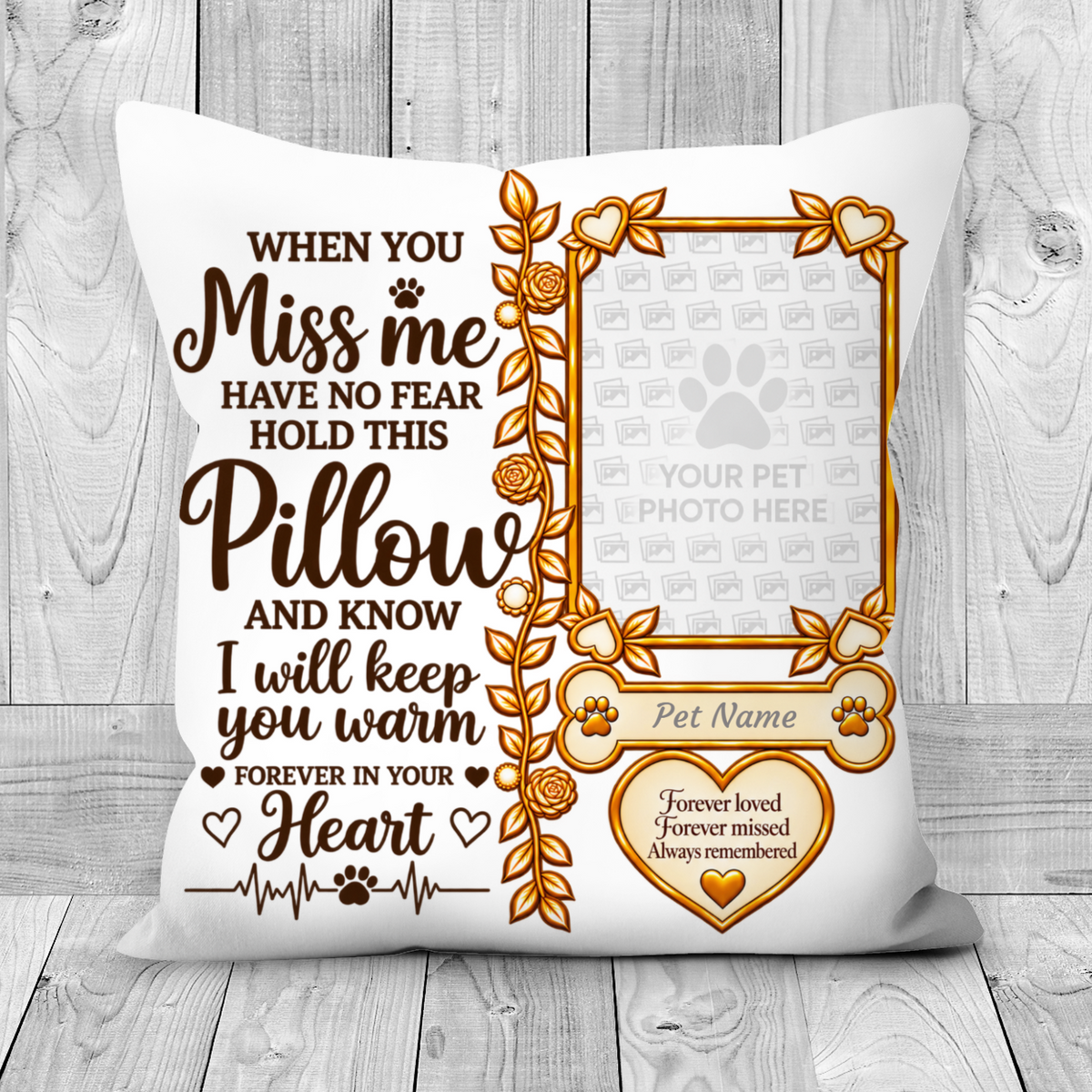 A white pet memorial throw pillow with brown and gold printed text and a photo frame design, displayed against a light gray wood plank background.